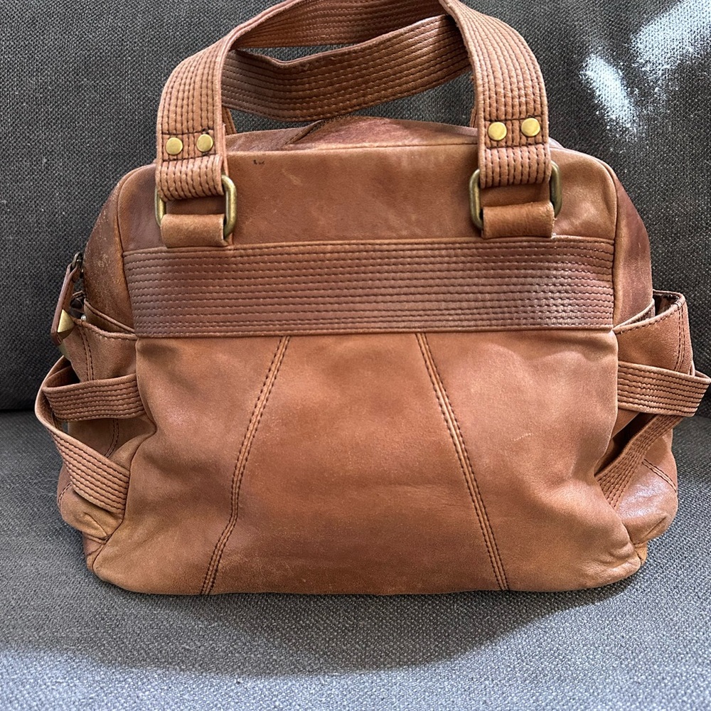 Leather shoulder bag with lots of pockets by Steve Madden